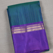 Peacock Blue Softsilk Saree With Magenta Borders