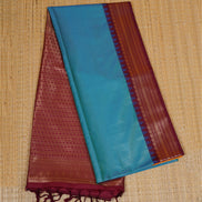 Peacock Blue Kanchipuram Semi Soft Silk Saree with Ganga Jamuna Borders